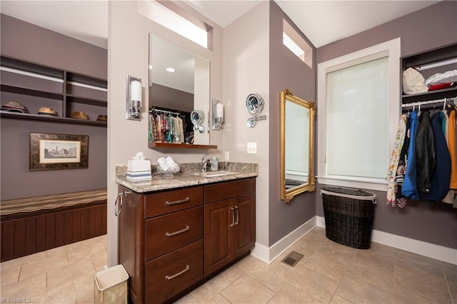 bathroom featuring vanity and tile patterned floors