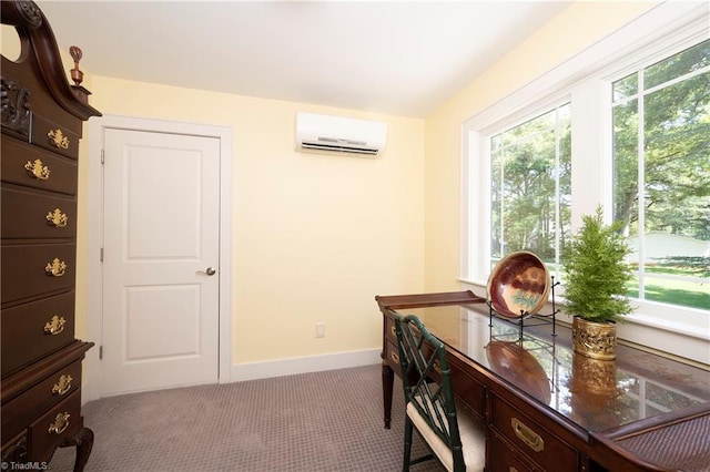 carpeted office with a wall unit AC