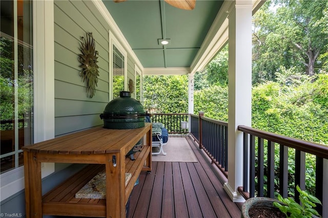 wooden terrace with ceiling fan