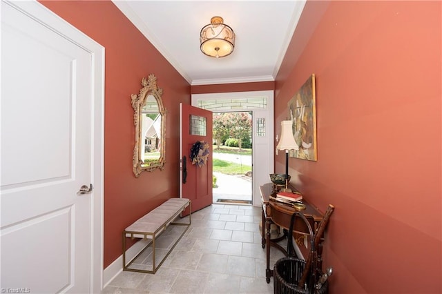 doorway to outside with crown molding and light tile patterned flooring