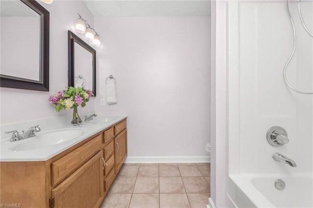 full bathroom featuring bathtub / shower combination, toilet, vanity, and tile patterned flooring