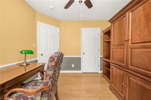 office area featuring light wood-type flooring and ceiling fan