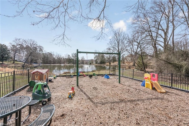 view of jungle gym with a water view