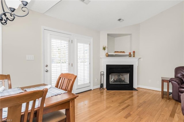 dining room with light hardwood / wood-style floors