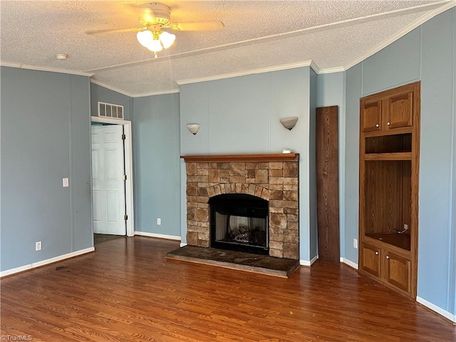 unfurnished living room with ceiling fan, crown molding, dark hardwood / wood-style floors, and a textured ceiling