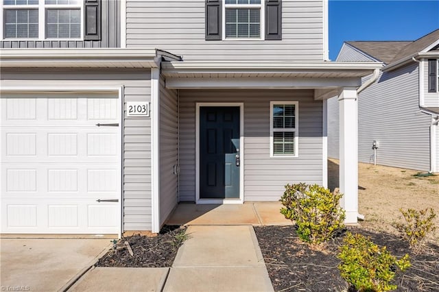 doorway to property featuring covered porch