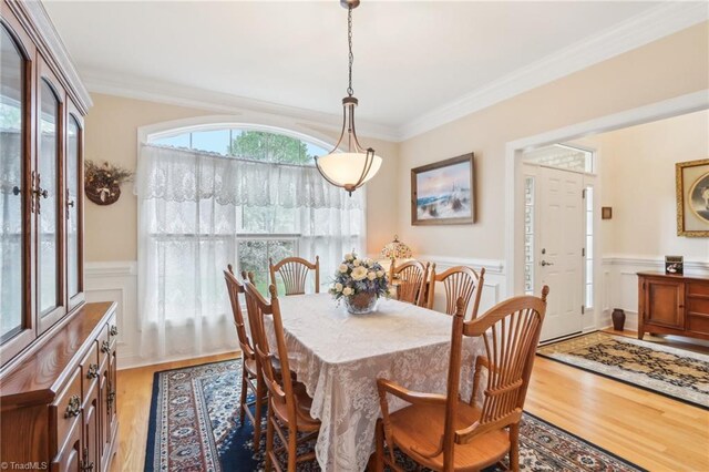 100 Wentworth Dr, Winston-Salem, NC 27107 - dining area with a wainscoted wall, crown molding, and light wood-style floors