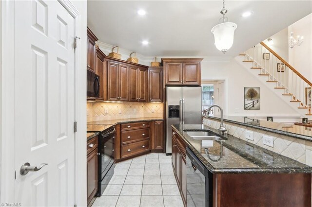 100 Wentworth Dr, Winston-Salem, NC 27107 - kitchen with tasteful backsplash, crown molding, light tile patterned flooring, black appliances, and a sink
