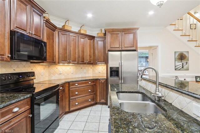 100 Wentworth Dr, Winston-Salem, NC 27107 - kitchen featuring a sink, tasteful backsplash, black appliances, and crown molding