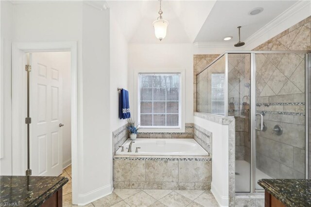 100 Wentworth Dr, Winston-Salem, NC 27107 - bathroom featuring a garden tub, ornamental molding, a stall shower, tile patterned floors, and vanity