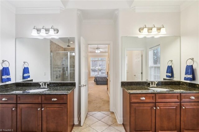 100 Wentworth Dr, Winston-Salem, NC 27107 - bathroom featuring a sink, ornamental molding, a shower stall, and tile patterned floors