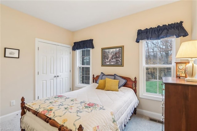 100 Wentworth Dr, Winston-Salem, NC 27107 - carpeted bedroom with baseboards and a closet