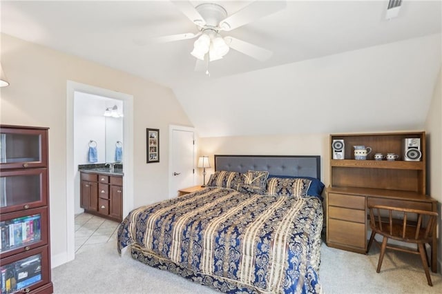 100 Wentworth Dr, Winston-Salem, NC 27107 - bedroom featuring visible vents, vaulted ceiling, light carpet, ensuite bath, and a sink