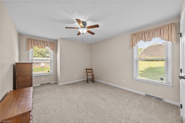 1941 Larkhill Dr, Kernersville, NC 27284 - carpeted spare room with a ceiling fan and healthy amount of natural light
