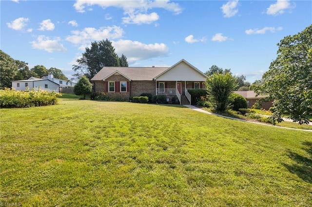 1941 Larkhill Dr, Kernersville, NC 27284 - single story home with covered porch, a front yard, and brick siding