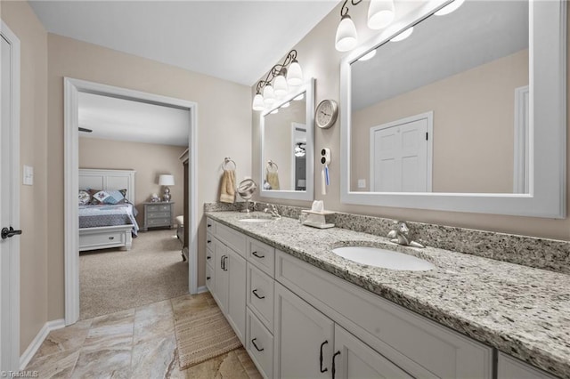 1941 Larkhill Dr, Kernersville, NC 27284 - ensuite bathroom featuring double vanity and baseboards