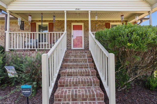 1941 Larkhill Dr, Kernersville, NC 27284 - property entrance with brick siding and a porch