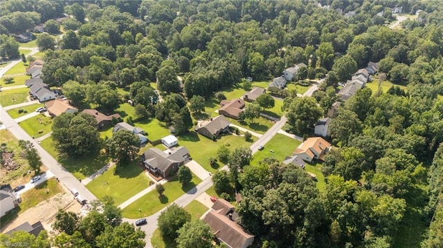 1941 Larkhill Dr, Kernersville, NC 27284 - aerial overview of property's location with nearby suburban area and a heavily wooded area