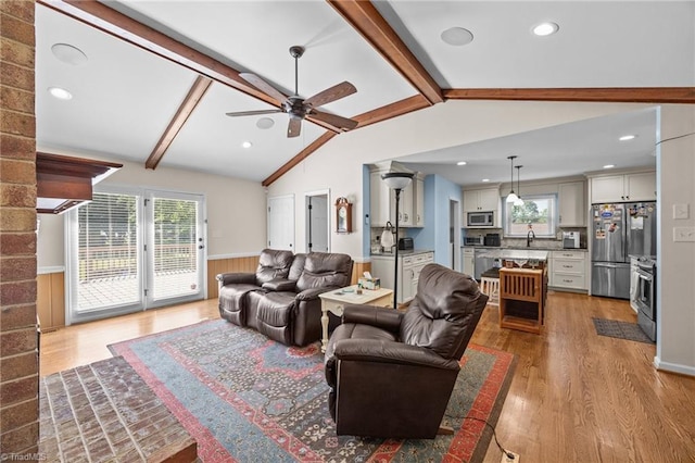 1941 Larkhill Dr, Kernersville, NC 27284 - living area with light wood-style floors, a ceiling fan, wainscoting, and recessed lighting
