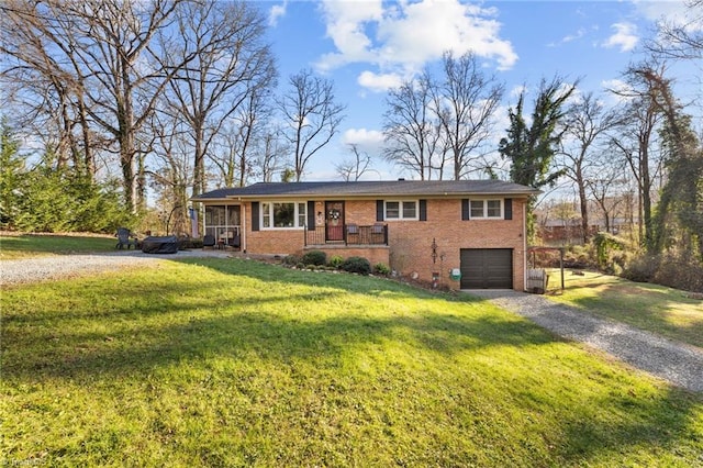 view of front of house with a front lawn and a garage