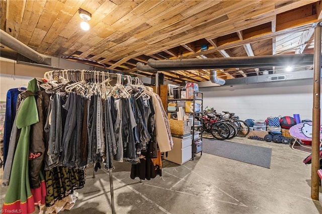 basement featuring wooden ceiling