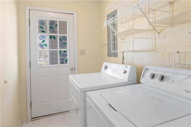 laundry area with separate washer and dryer