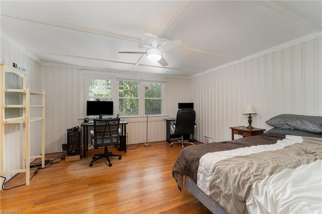 bedroom featuring wood-type flooring and ceiling fan