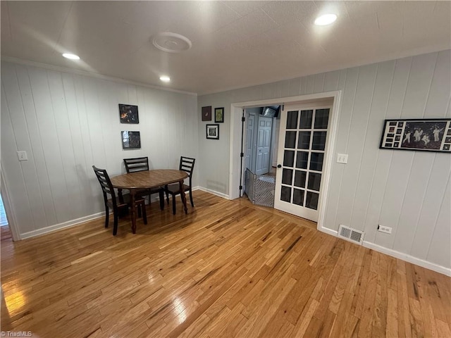 dining area featuring light wood-type flooring