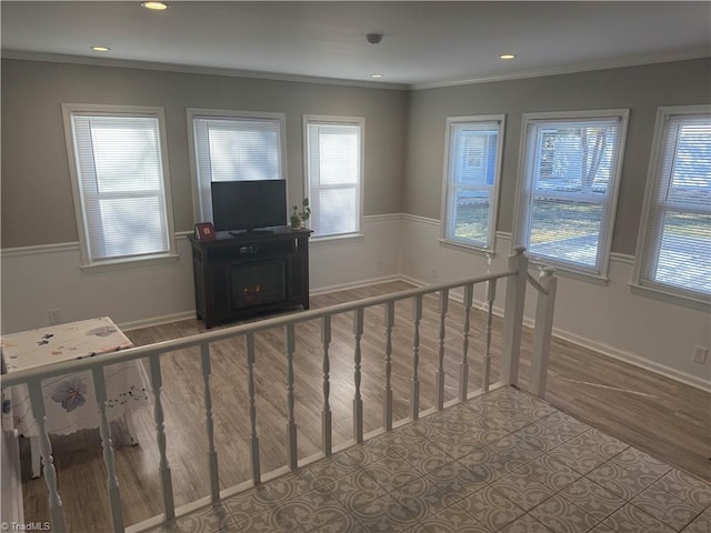 interior space with crown molding