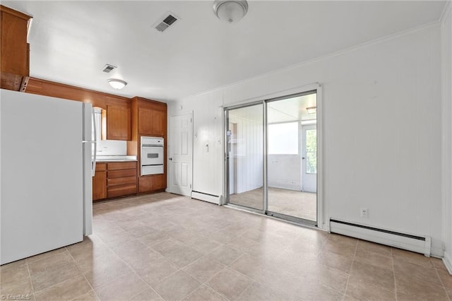 kitchen featuring a warming drawer, visible vents, baseboard heating, white appliances, and brown cabinets