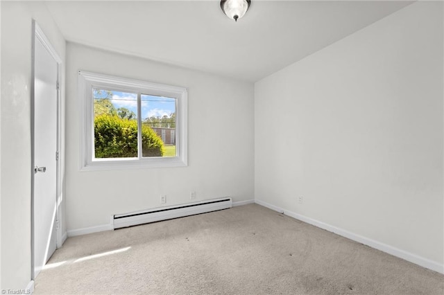 unfurnished room featuring baseboards, carpet, and baseboard heating