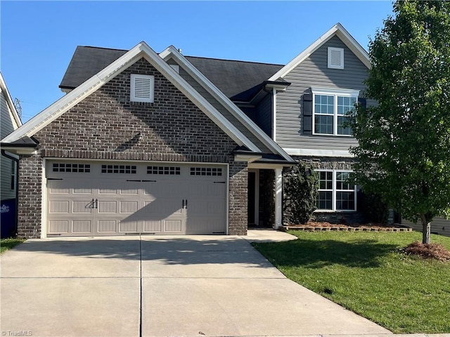 craftsman inspired home featuring brick siding, an attached garage, driveway, and a front yard