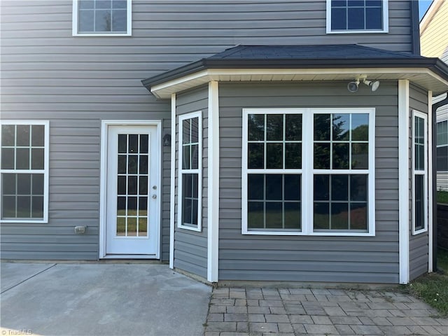 doorway to property featuring a patio