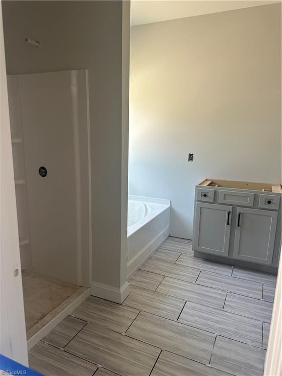 3293 Alyssa Way Lot 3, High Point, NC 27265 - full bath featuring a bath, a stall shower, and wood tiled floors