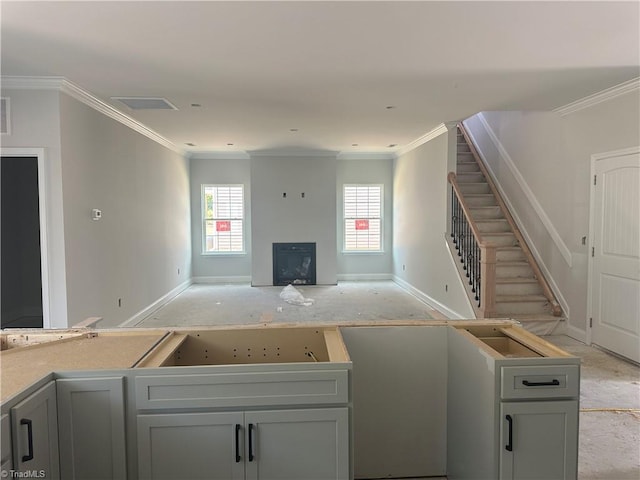 3293 Alyssa Way Lot 3, High Point, NC 27265 - unfurnished living room with healthy amount of natural light, a fireplace, stairway, and crown molding