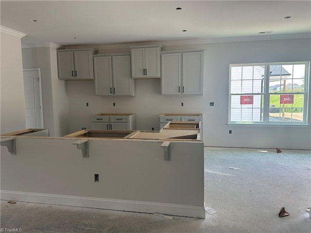 3293 Alyssa Way Lot 3, High Point, NC 27265 - kitchen featuring ornamental molding, a center island, a breakfast bar, and gray cabinets