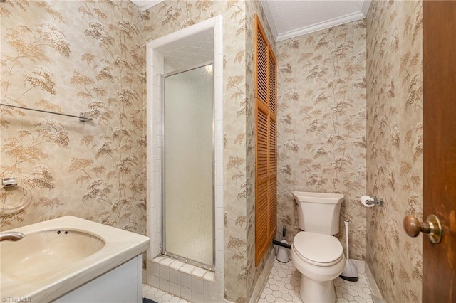 bathroom with toilet, tile patterned flooring, a shower with shower door, and crown molding