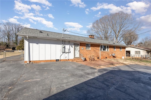 rear view of property featuring a patio