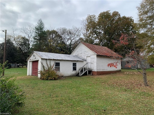 view of property exterior featuring a yard