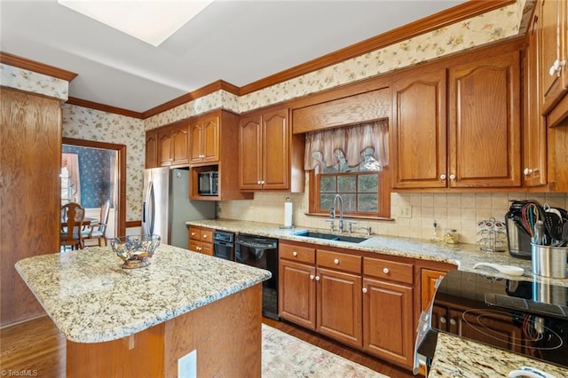 kitchen featuring wallpapered walls, stainless steel fridge, dishwasher, brown cabinets, and a sink