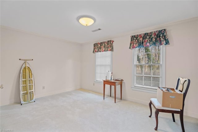 living area featuring ornamental molding, carpet, visible vents, and baseboards