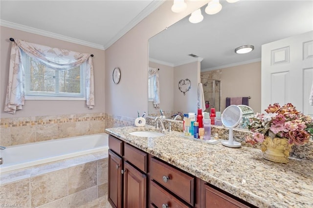 full bath featuring a garden tub, crown molding, visible vents, a stall shower, and vanity