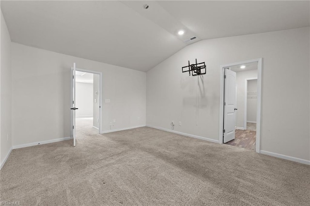 interior space featuring vaulted ceiling