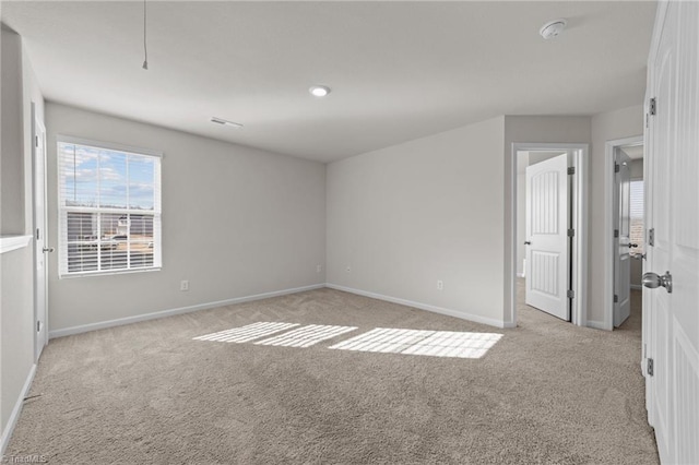 view of carpeted spare room