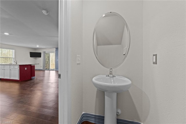 bathroom featuring wood-type flooring