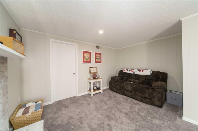 carpeted living room with a textured ceiling, a brick fireplace, and ornamental molding