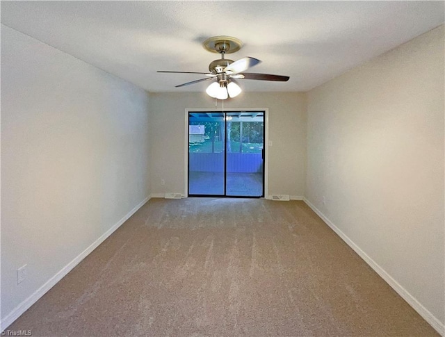 6630 Riverwood Rd, Walkertown, NC 27051 - carpeted spare room with a ceiling fan and baseboards