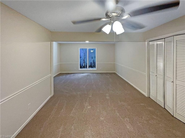 6630 Riverwood Rd, Walkertown, NC 27051 - unfurnished bedroom featuring carpet floors, a closet, and ceiling fan