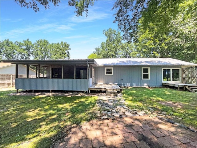 6630 Riverwood Rd, Walkertown, NC 27051 - rear view of property with a deck and a sunroom