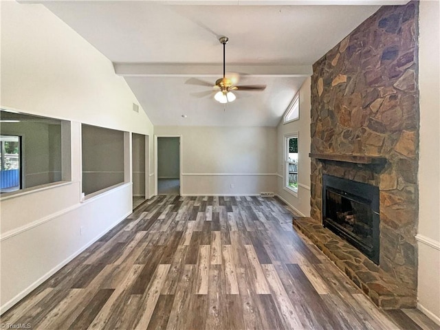 6630 Riverwood Rd, Walkertown, NC 27051 - unfurnished living room featuring a fireplace, ceiling fan, wood finished floors, and healthy amount of natural light